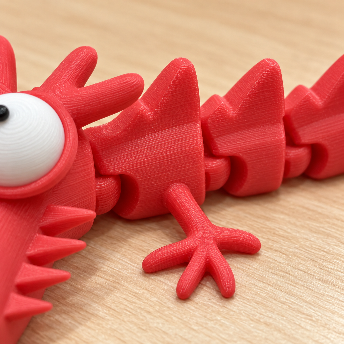 Big-Eyed Articulated Dragon Figurine – 4 Colour Options · mproduct-5a19d474da7a09fd1336