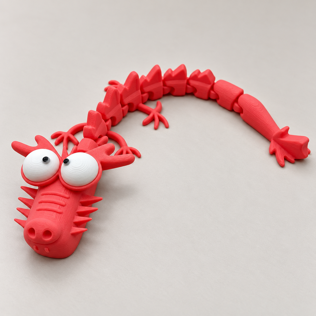 Big-Eyed Articulated Dragon Figurine – 4 Colour Options · mproduct-5d4549a28d16ee3e2d5d