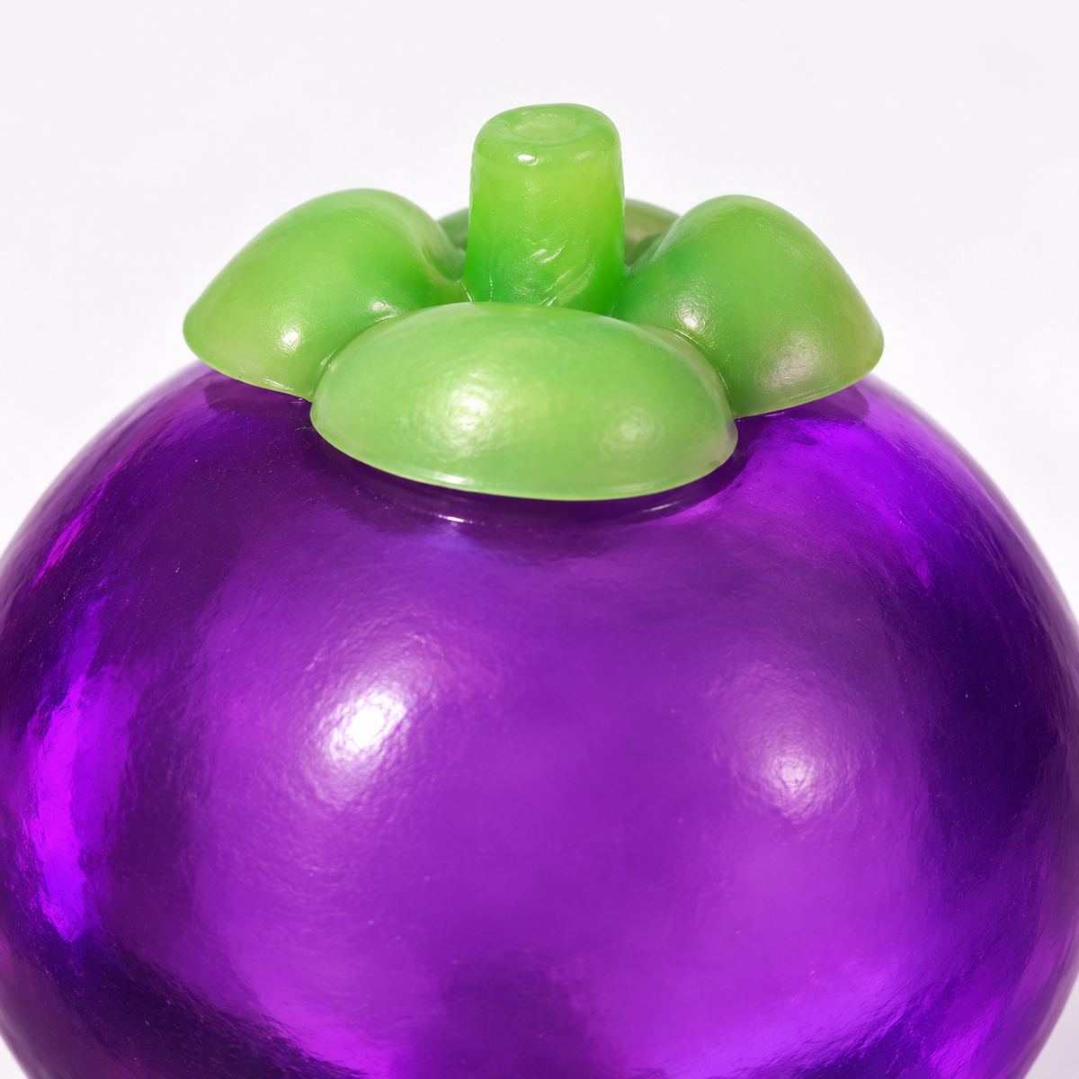 Purple Mangosteen Squishy Toy with a Green Leaf Top · mproduct-838a304eb075417e8031