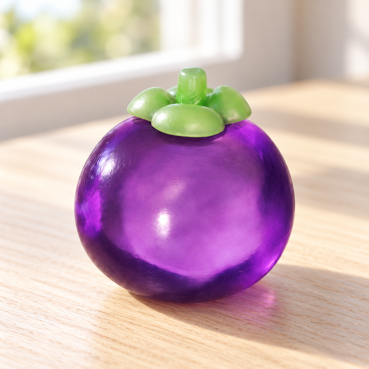 Purple Mangosteen Squishy Toy with a Green Leaf Top · mproduct-8a193a431a63484ff94b