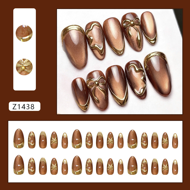 Gilded Phantom Cat Eye Bow Press On Nail Set · mproduct-8b9786c18fc19e0518b6