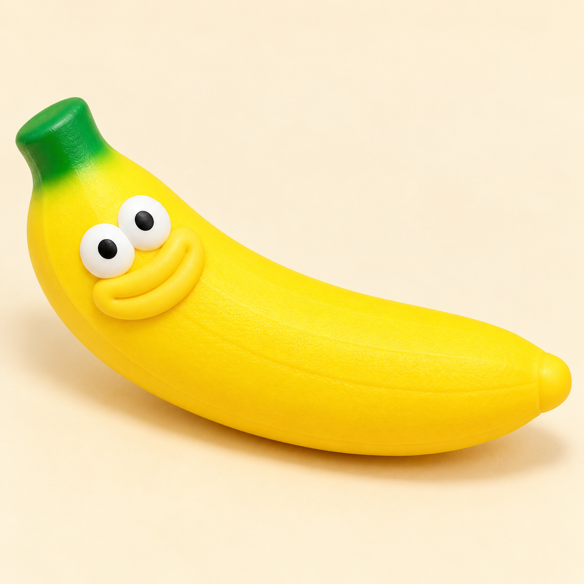 Banana Crunchy Squishy Toy with a Curved Yellow Shape and Funny Face · mproduct-a292804229479570ae2b