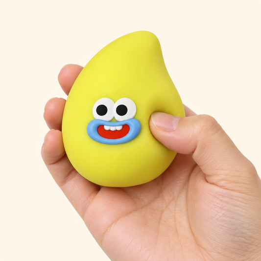 Yellow Mango Squishy Toy with a Rounded Shape and Funny Face · mproduct-ce596ed571a684727556