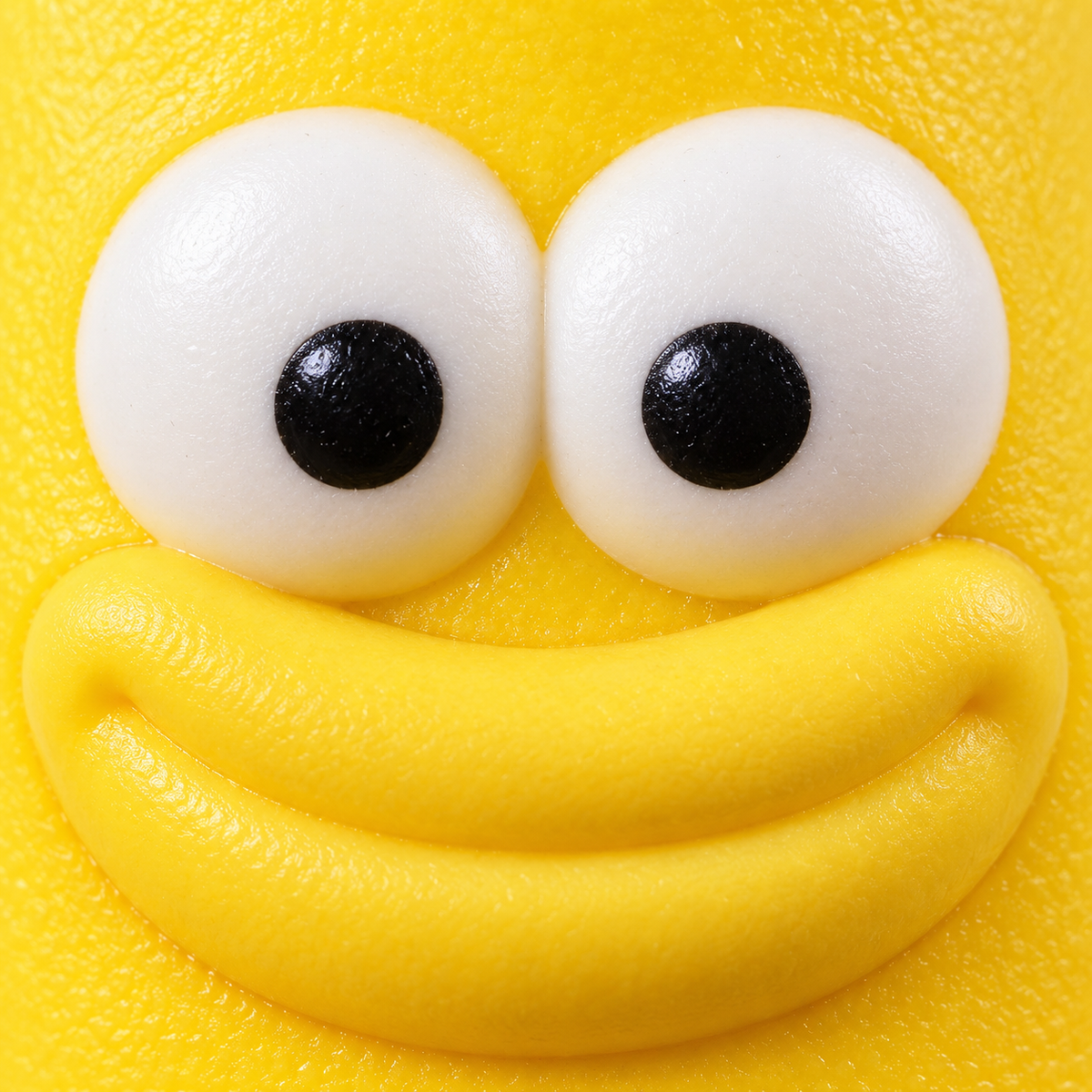 Banana Crunchy Squishy Toy with a Curved Yellow Shape and Funny Face · mproduct-fa12704e59b79abc76be
